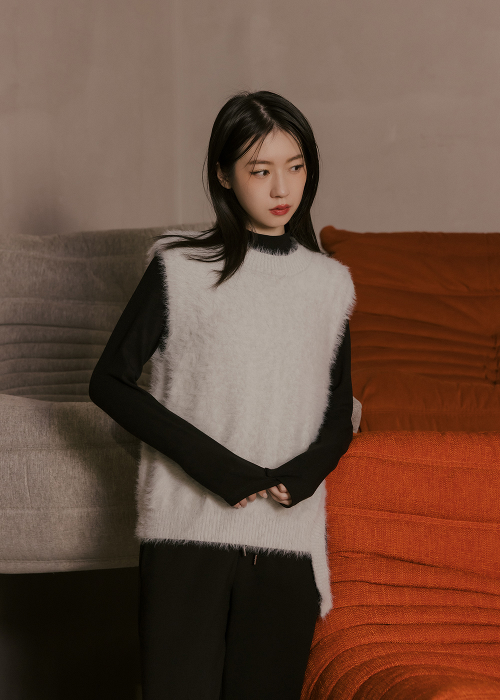 設計不對稱仿貂針織背心