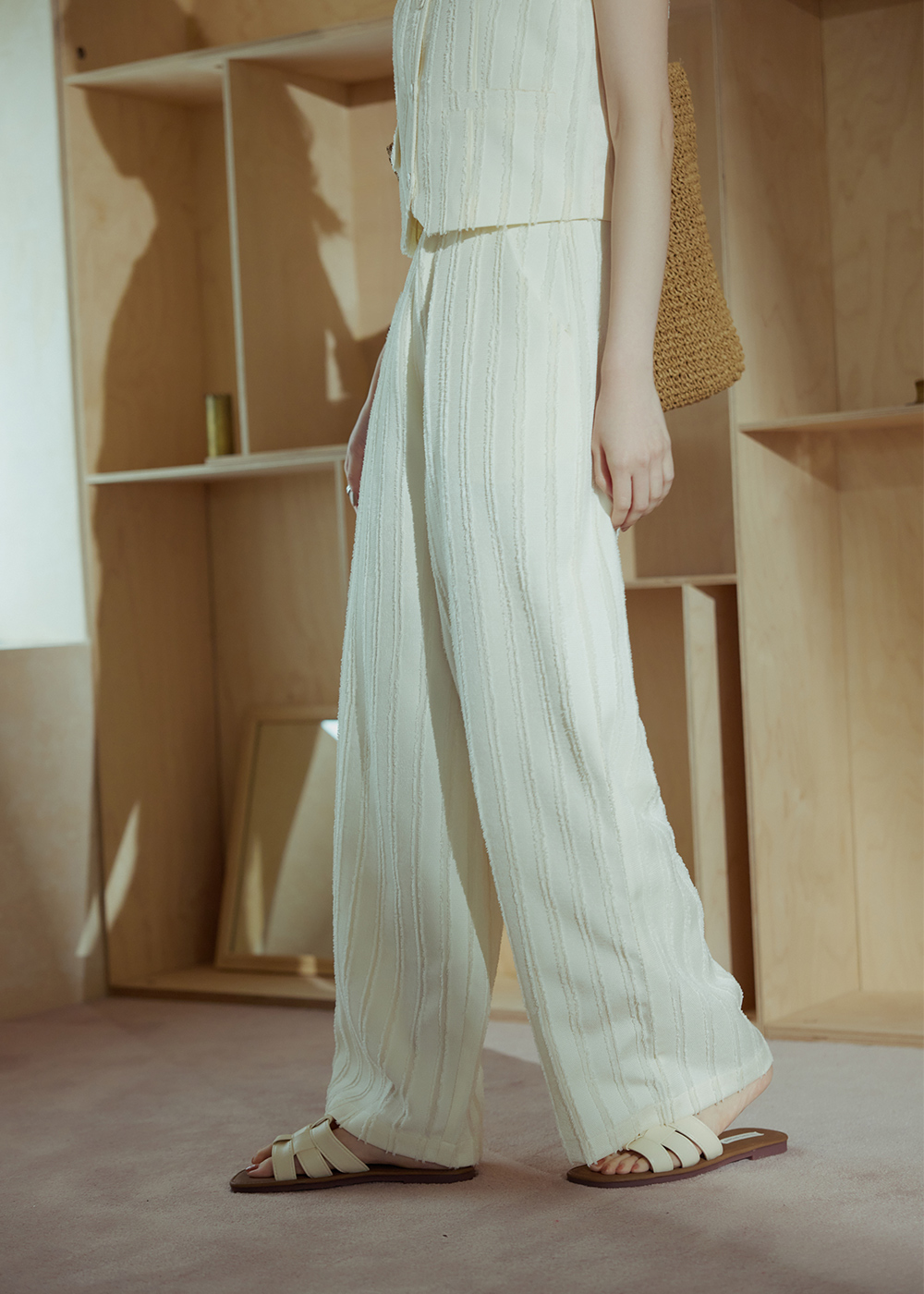 設計感緹花直條長褲